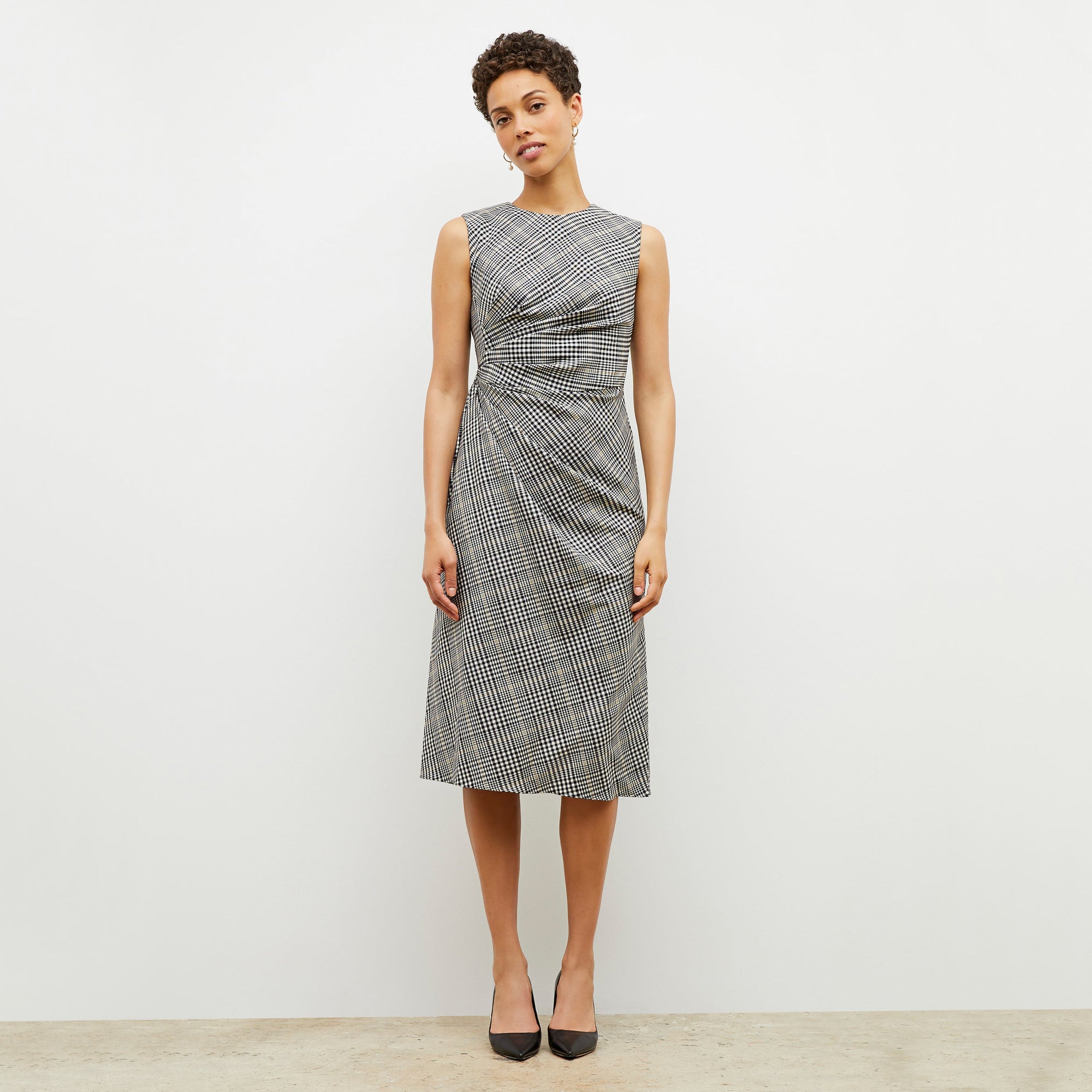 Front image of a woman wearing the jeannine dress in plaid sharkskin | Lead