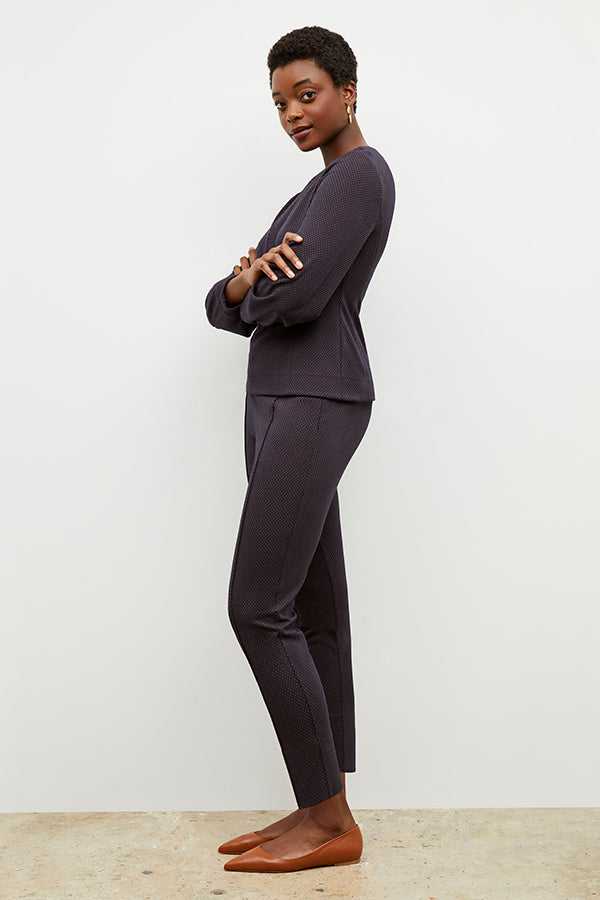 Front image of a woman wearing the rashida top in navy multi | Exclude