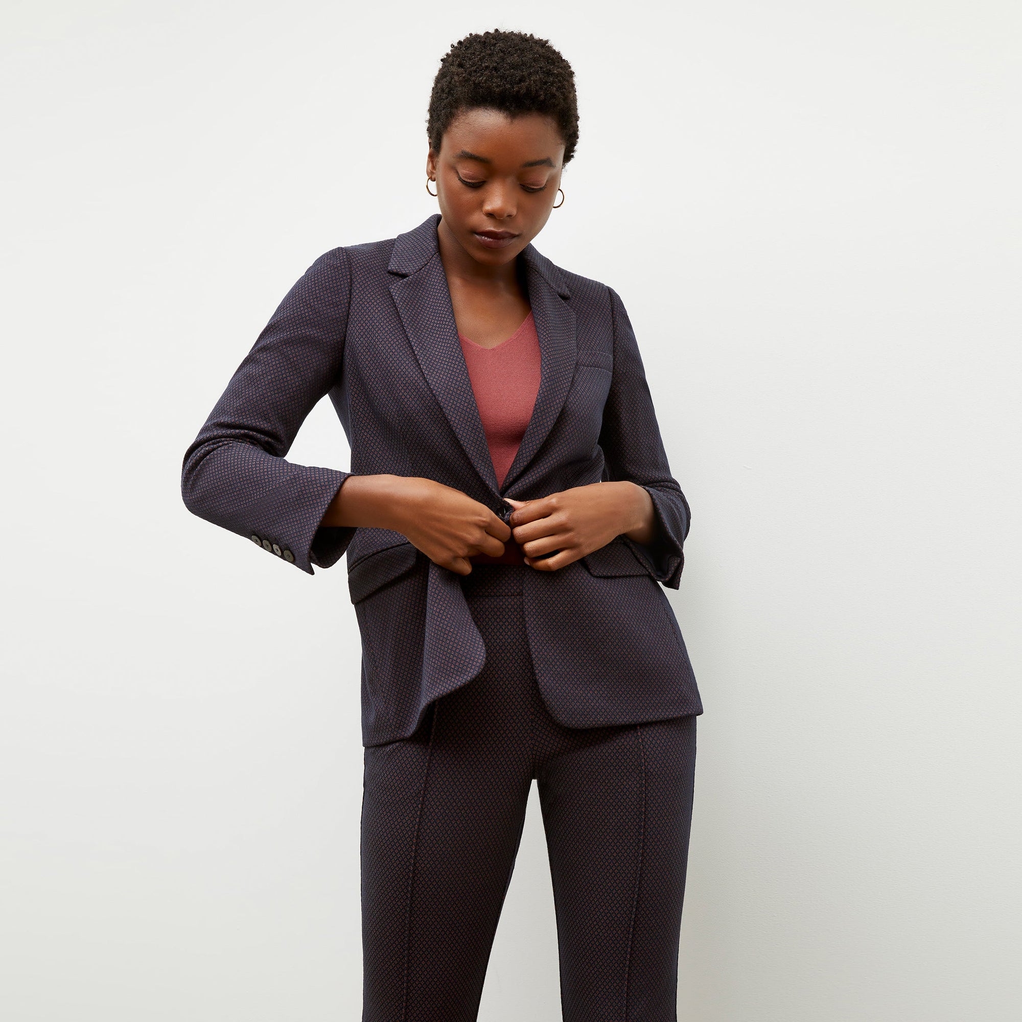 Front image of a woman wearing the yiyan blazer in navy multi | Exclude