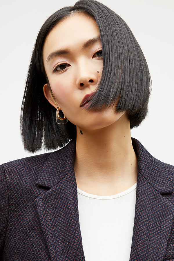 Front image of a woman wearing the yiyan blazer in navy multi | Exclude