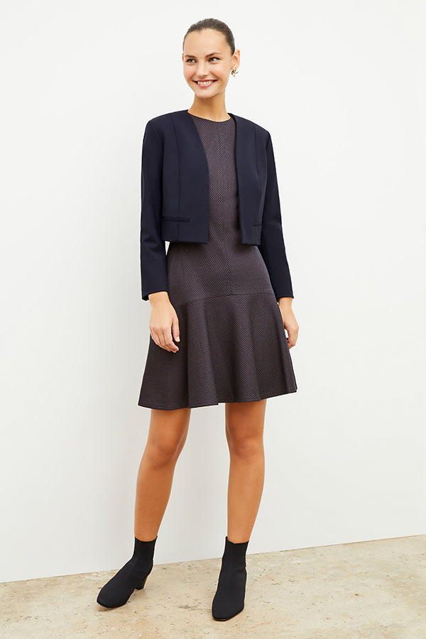 Front image of a woman wearing the jayde dress in navy multi | Exclude | Grid Hover