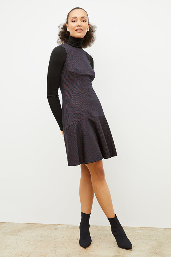 Front image of a woman wearing the jayde dress in navy multi | Exclude