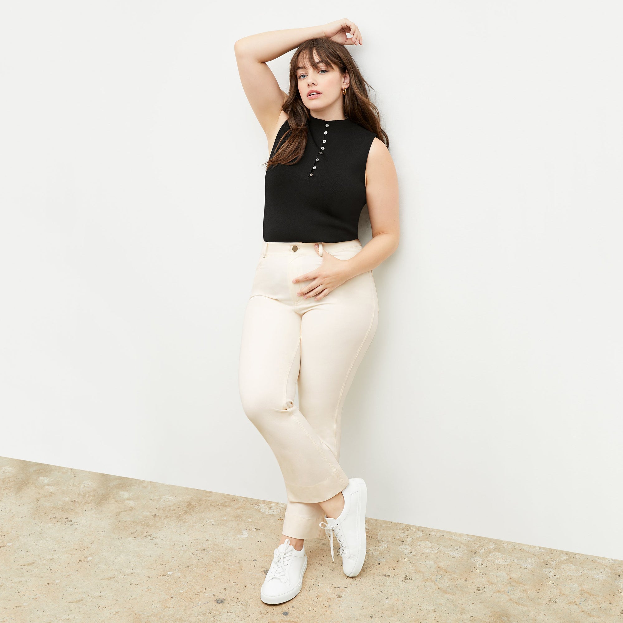 Front image of a woman wearing the Archie Jean in Tusk | Exclude