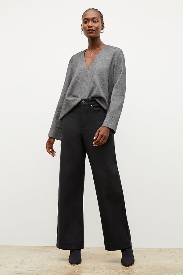 Front image of a woman wearing the Milo Jean in Black | Exclude