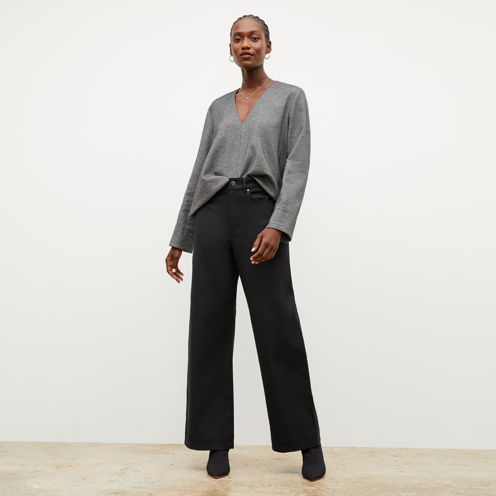 Front image of a woman wearing the Milo Jean in Black | Exclude