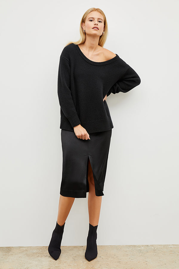 Image of a woman wearing the Penny Skirt in Black | Grid | Exclude