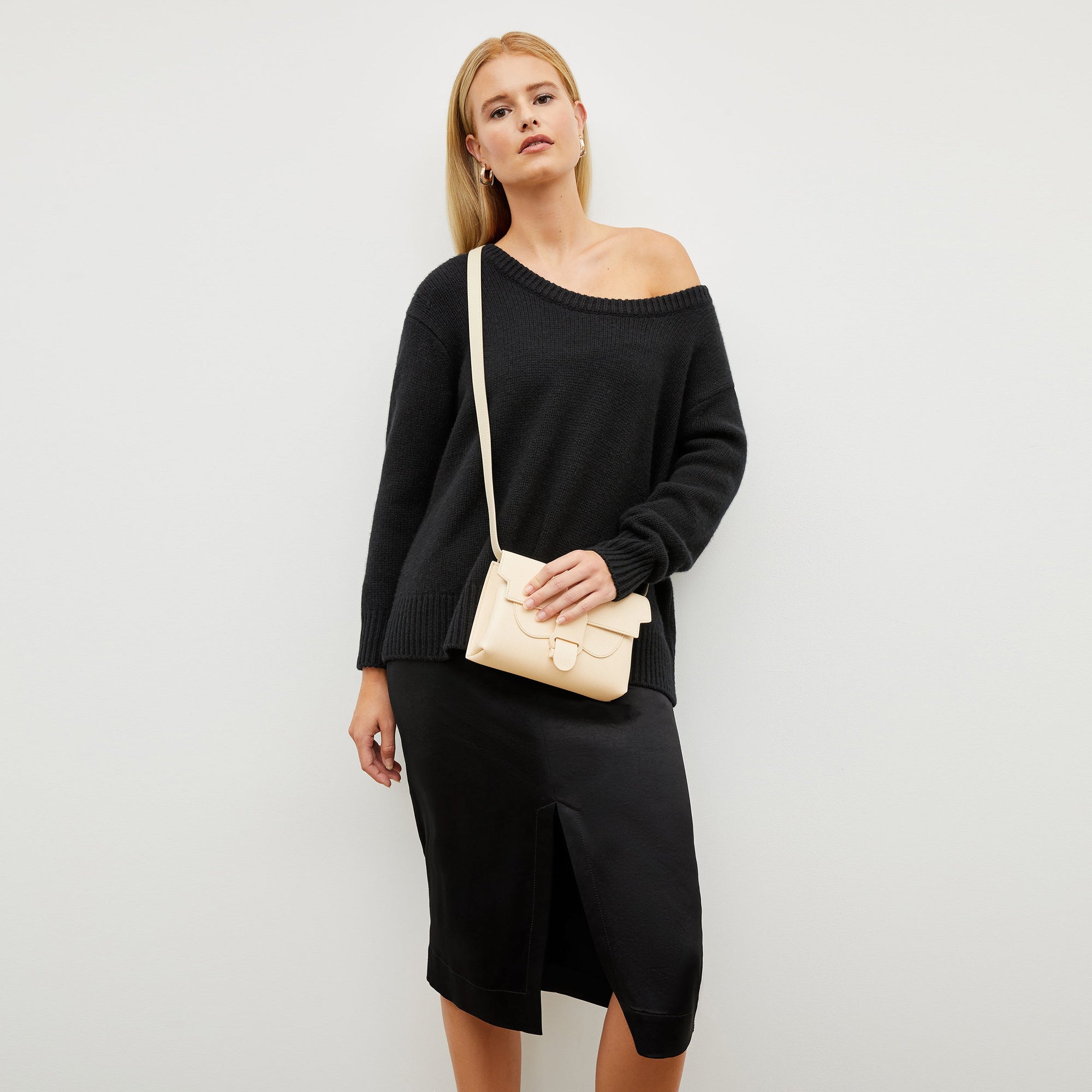 Image of a woman wearing the Penny Skirt in Black