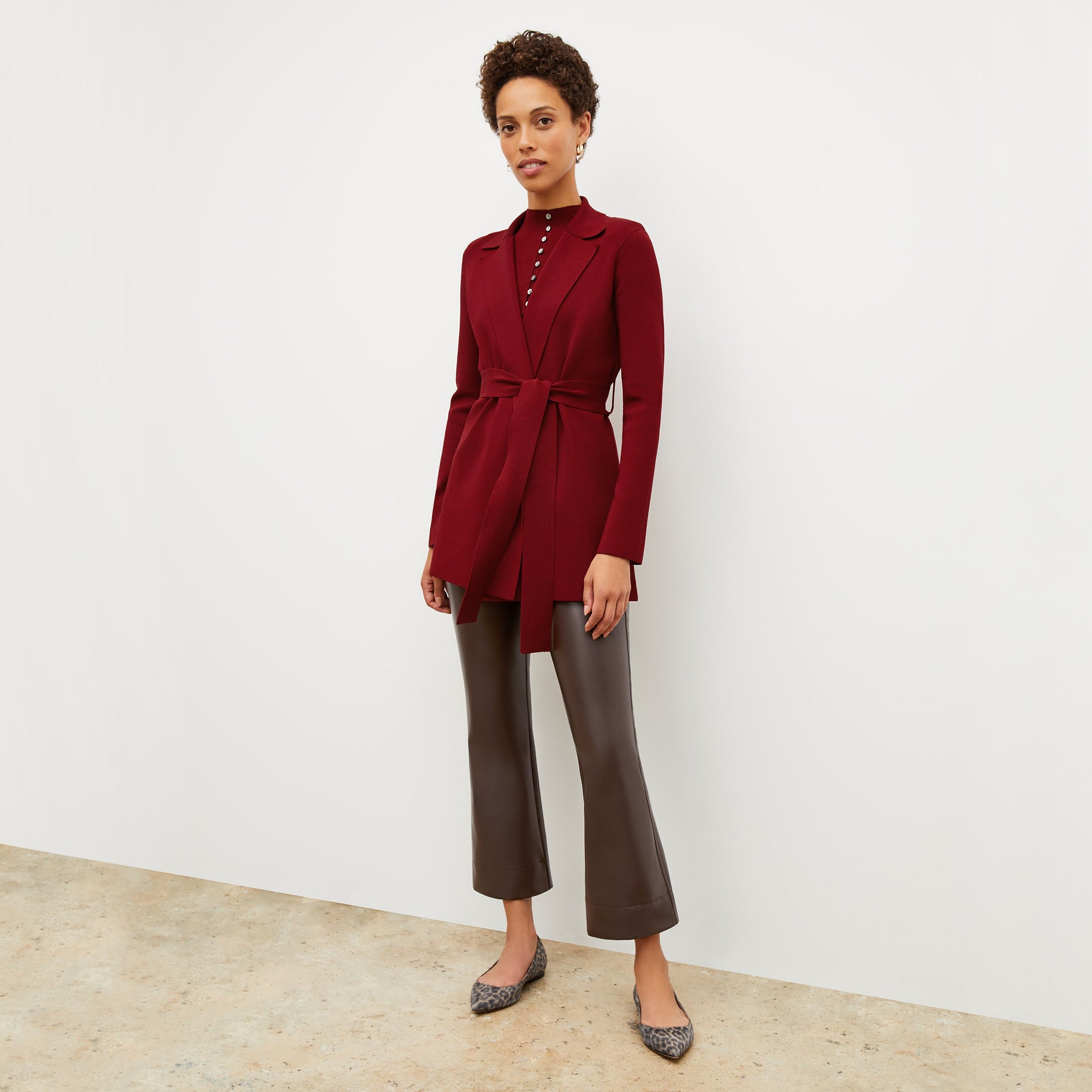 Front image of a woman wearing the archie pant in brown | Exclude