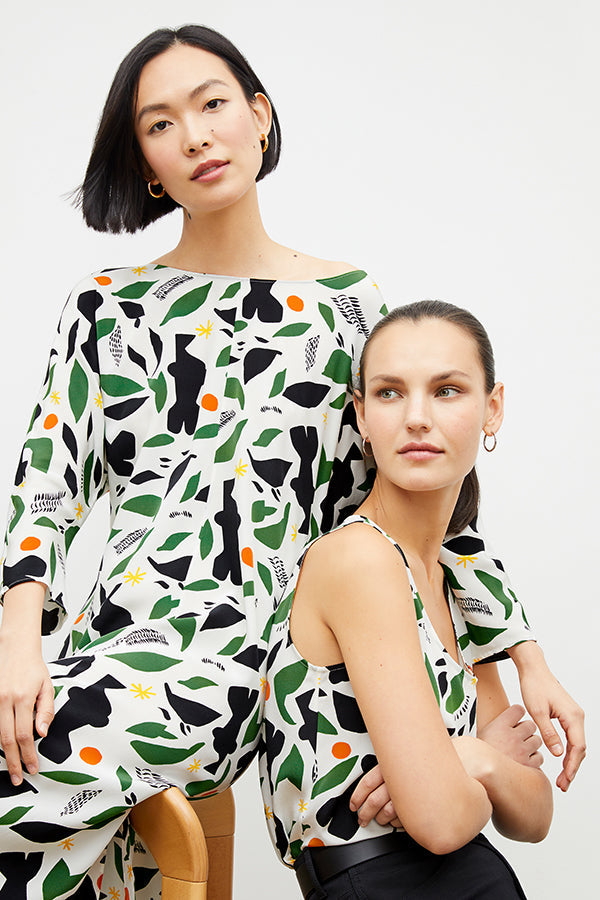 Front image of a woman wearing the alesia dress in icon print | Exclude