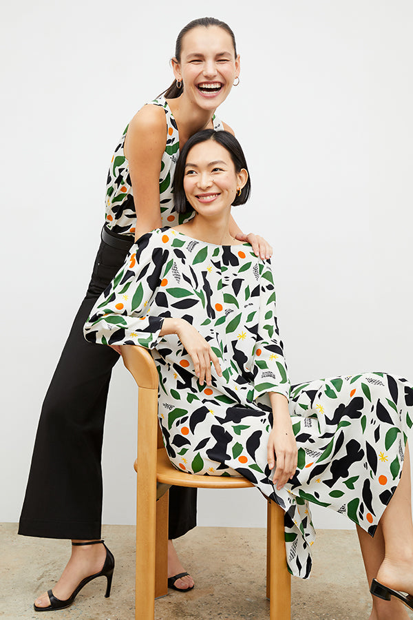 Front image of a woman wearing the alesia dress in icon print | Exclude