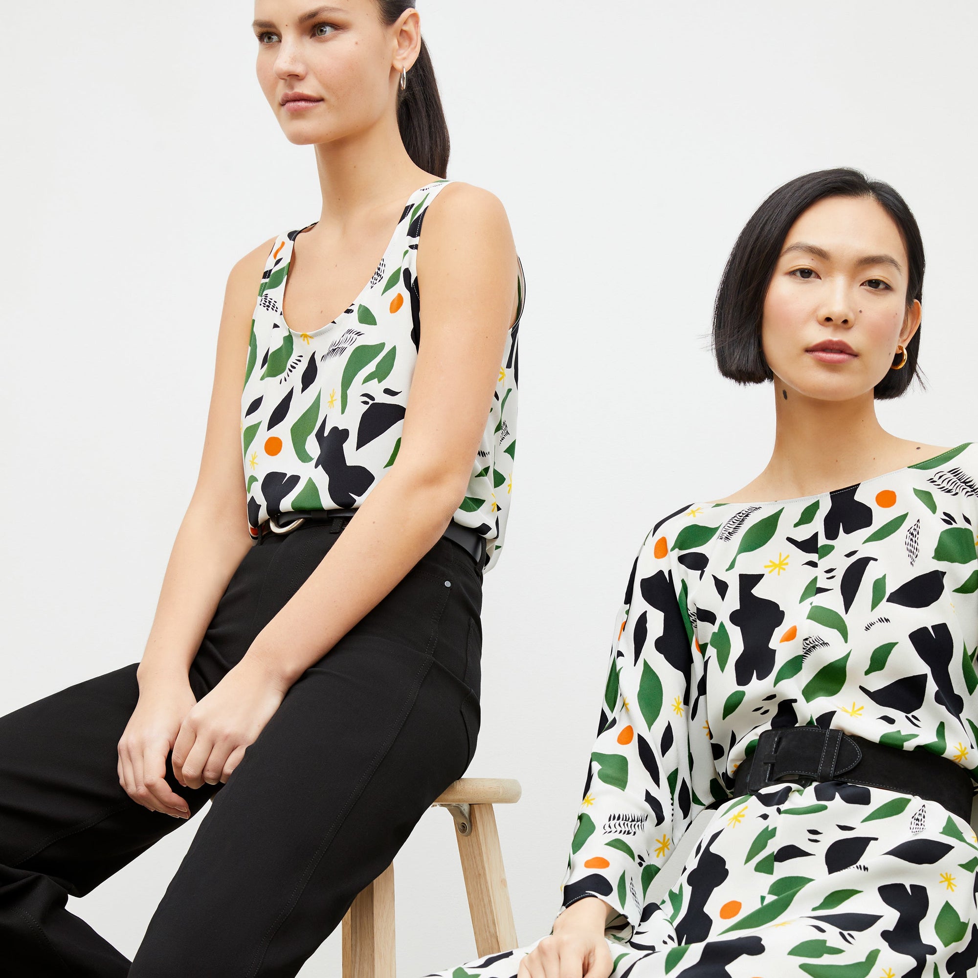 front image of woman wearing the alesia dress in icon print and woman wearing the vicky tank in icon print | Exclude