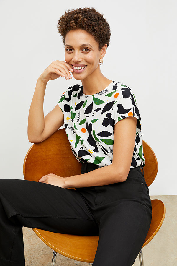 Front image of a woman sitting wearing the Milo Jean in Black | Exclude