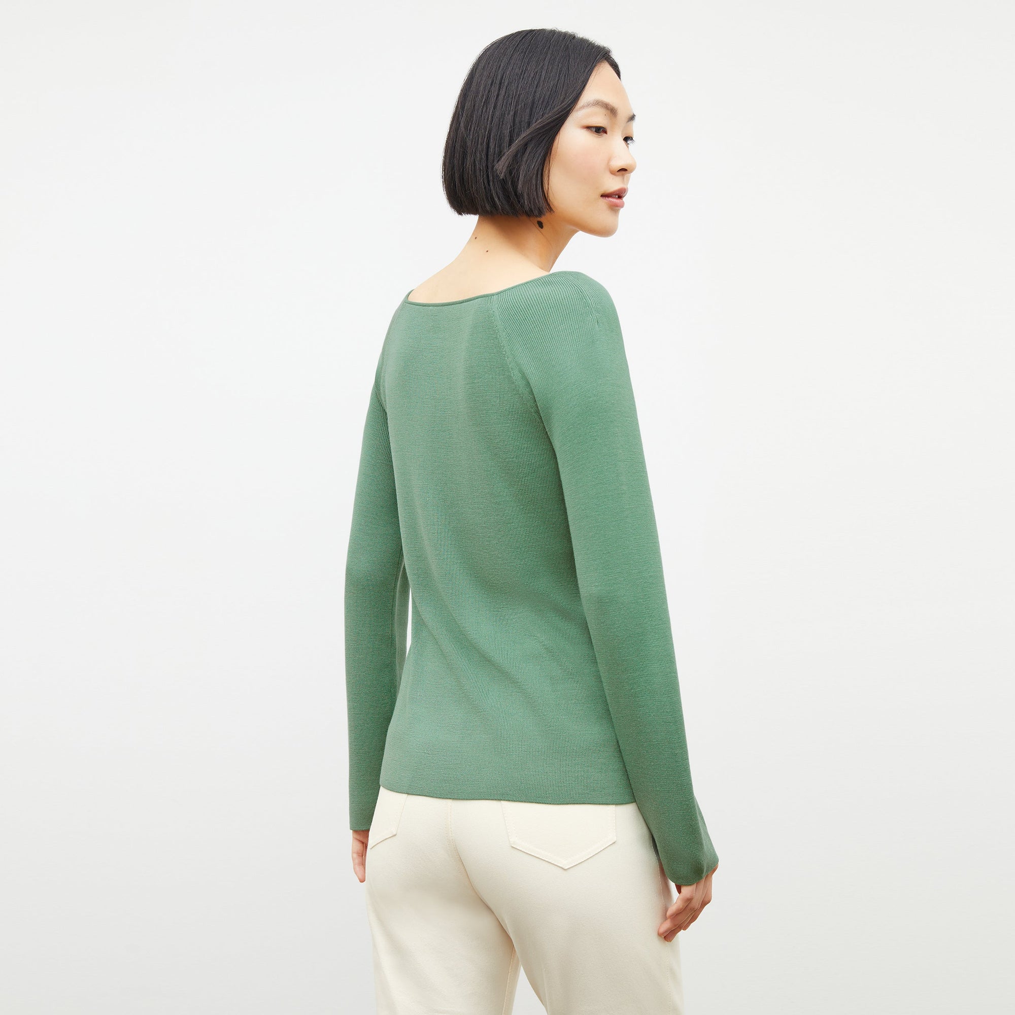 Back image of a woman standing wearing the Hockley Jean—Better Than Denim in Tusk | Exclude
