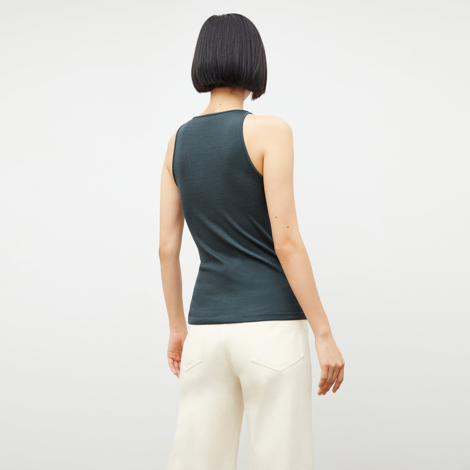 Back image of a woman wearing the Milo Jean in Tusk  | Exclude