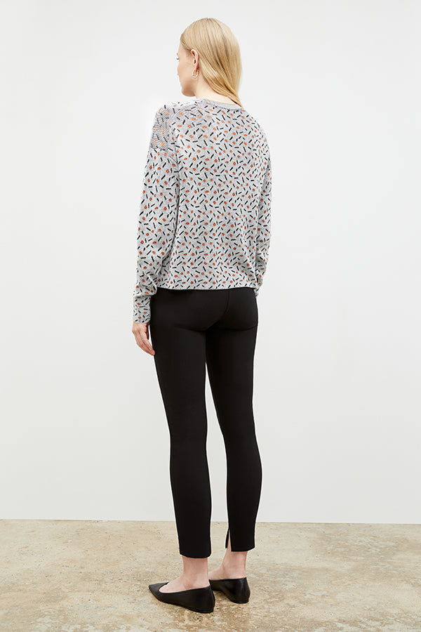 Back image of a woman wearing the Tyler Sweatshirt in Brick and Black | Exclude 