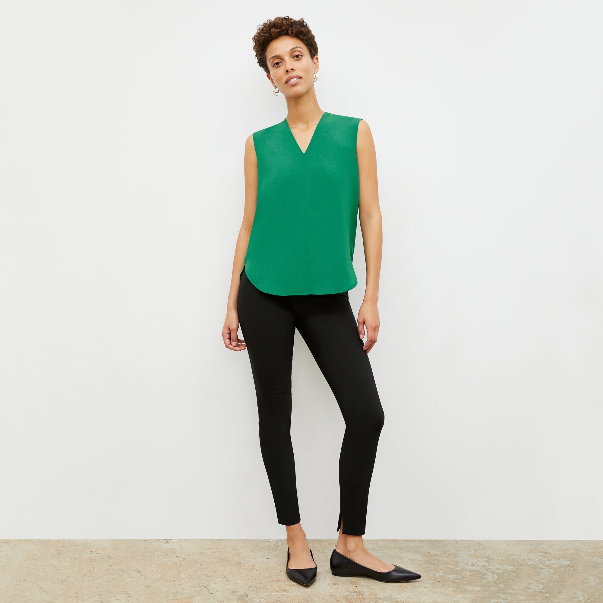 Front image of a woman wearing the skinny foster in black | Exclude