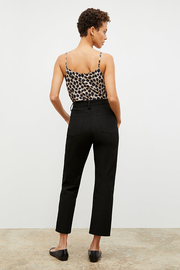 Back image of a woman standing wearing the Lisey Cami—Sahara Print Washable Silk in Tan/Black | Exclude