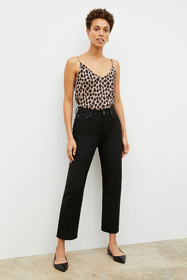 Front image of a woman standing wearing the Lisey Cami—Sahara Print Washable Silk in Tan/Black | Exclude