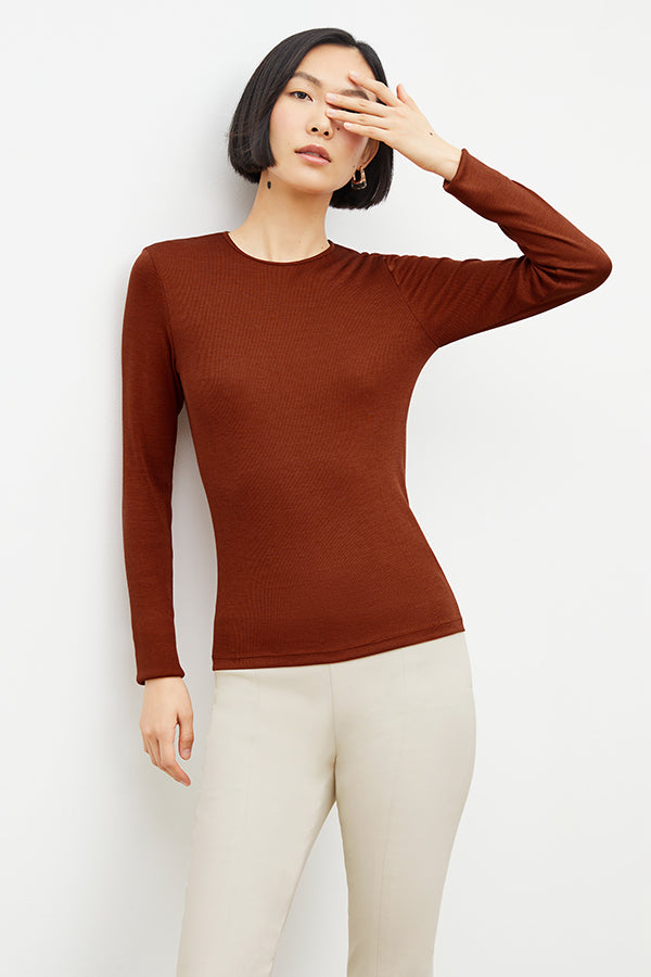 Front image of a woman standing wearing the foster pant in bone | Exclude