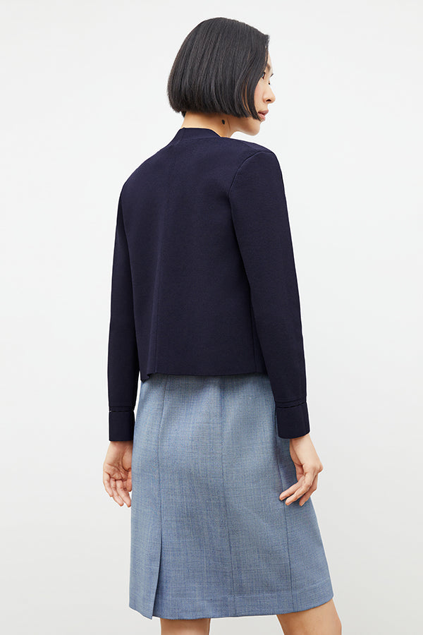 back image of a woman wearing the sant ambroeus jardigan in navy | Exclude