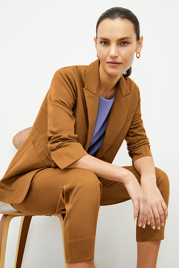 Front image of a woman wearing the Shane Pant in Acorn | Exclude 