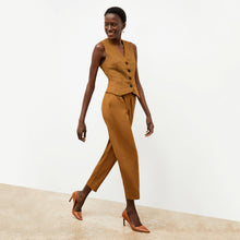 Front image of a woman wearing the Shane Pant in Acorn