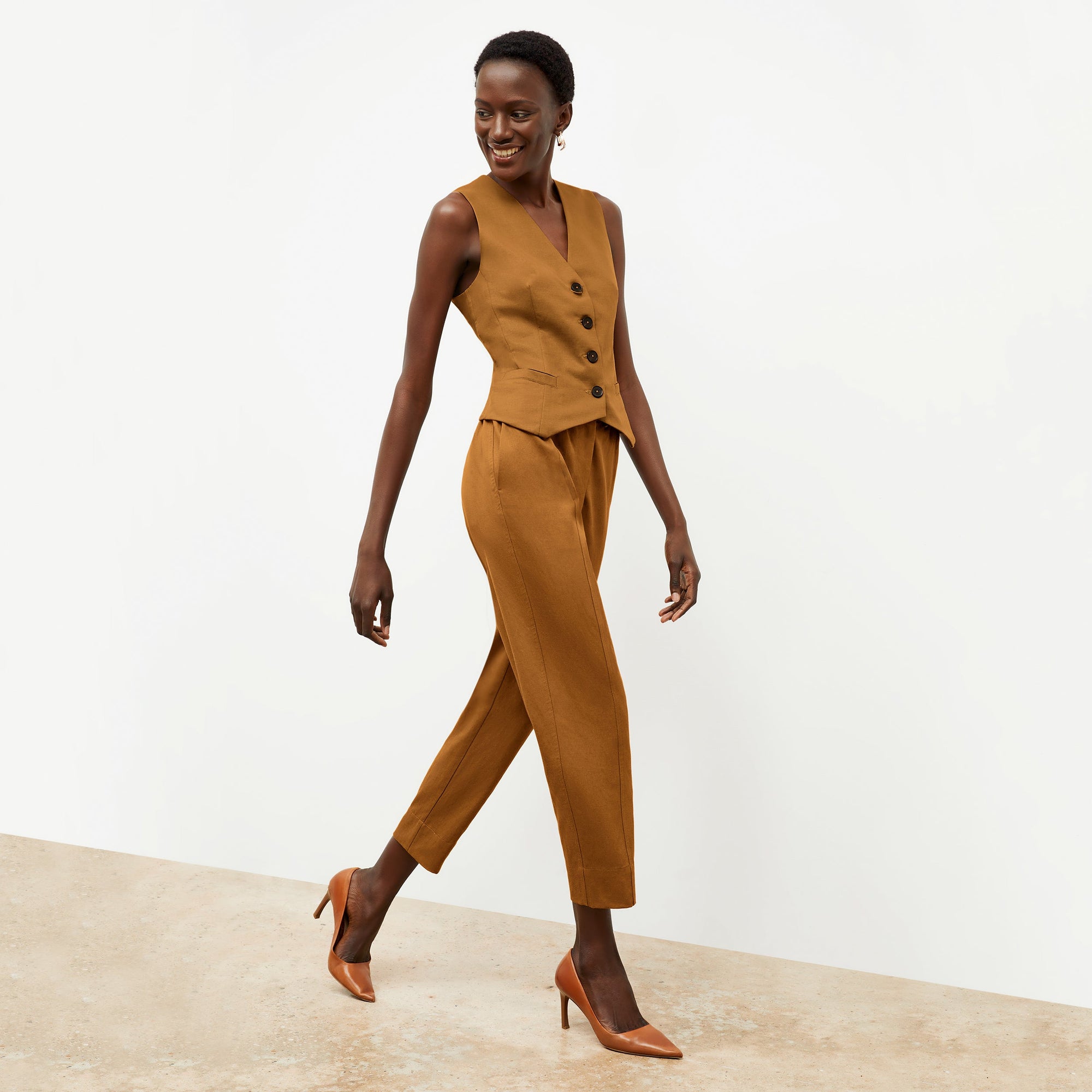 Front image of a woman wearing the Shane Pant in Acorn