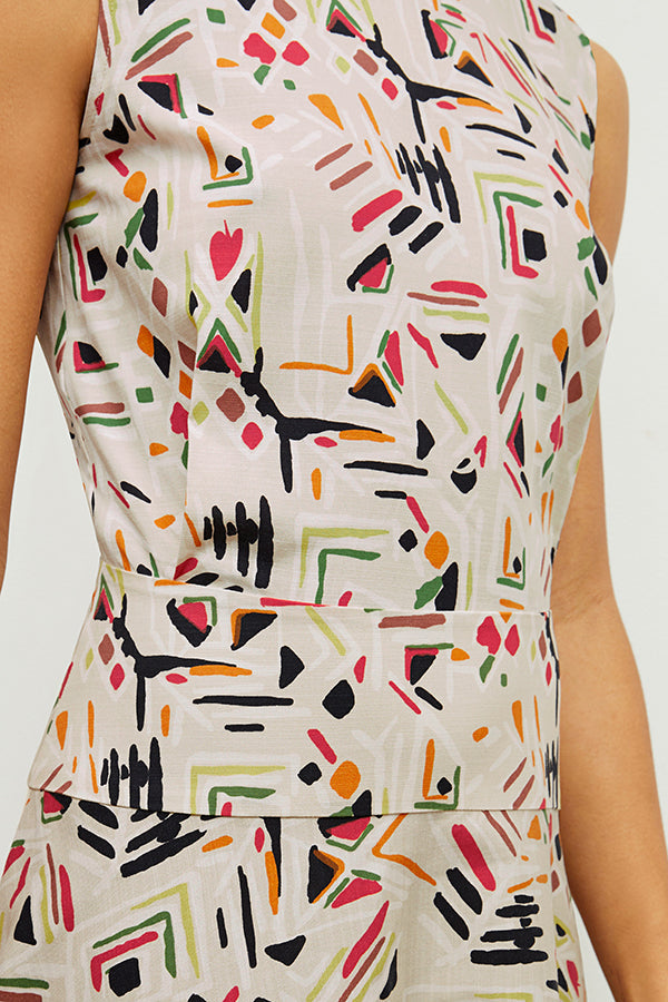 front image of a woman wearing the oona dress in rhythm print | Exclude | Grid Hover
