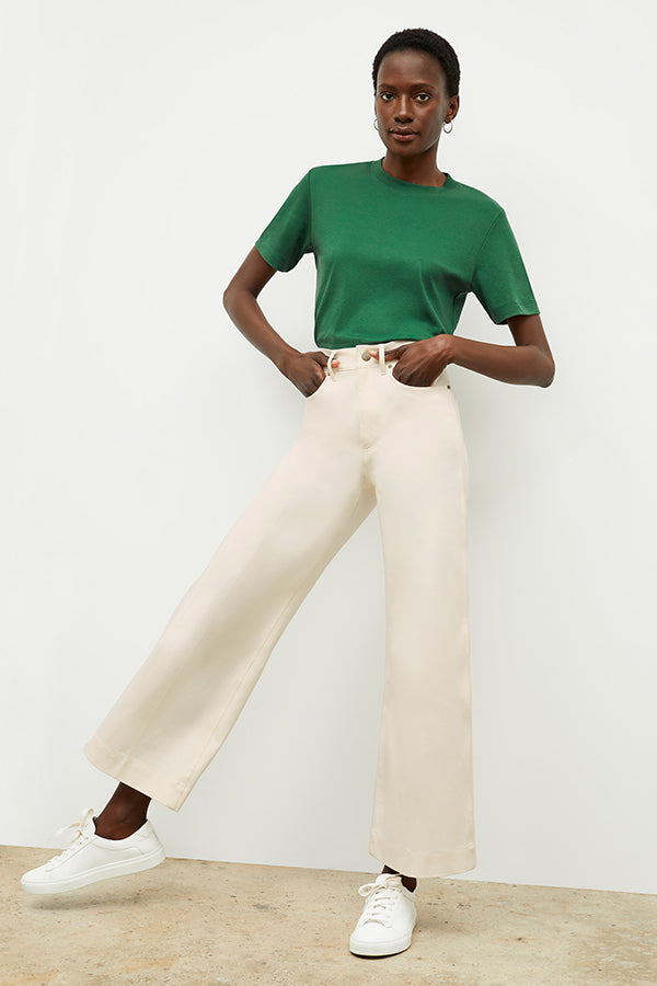 Front image of a woman wearing the Milo Jean in tusk | Exclude