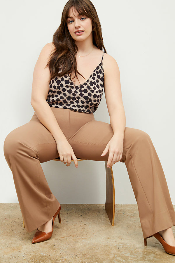 Front image of a woman standing wearing the Lisey Cami—Sahara Print Washable Silk in Tan/Black | Exclude