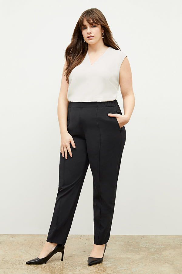 Front image of a woman standing wearing the Colby Jogger in Black | Exclude