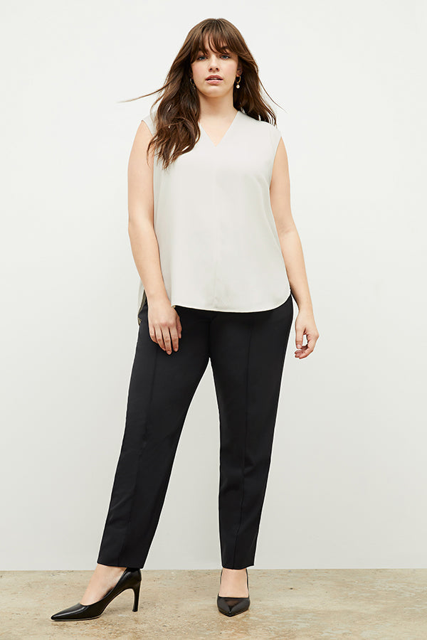 Front image of a woman standing wearing the Colby Jogger in Black | Exclude