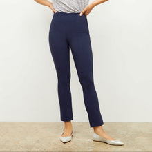Front image of a woman standing wearing the foster pant in dark navy | Lead