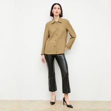 front image of a woman wearing the avelyn jacket in macaroon