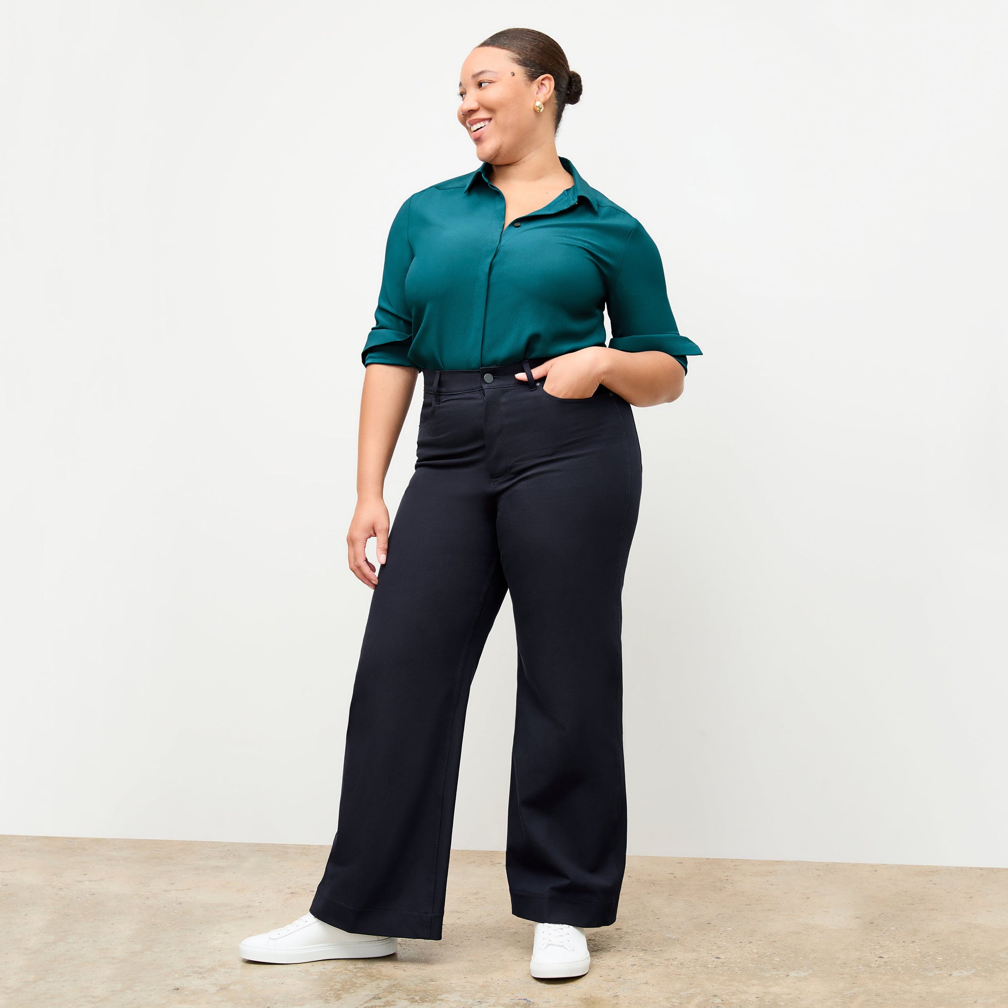 Front image of a woman standing wearing the Milo Jean in ink | Exclude