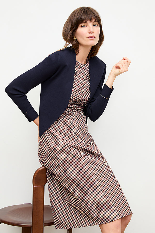 front image of a woman wearing the sant ambroeus jardigan in navy | Exclude | Grid