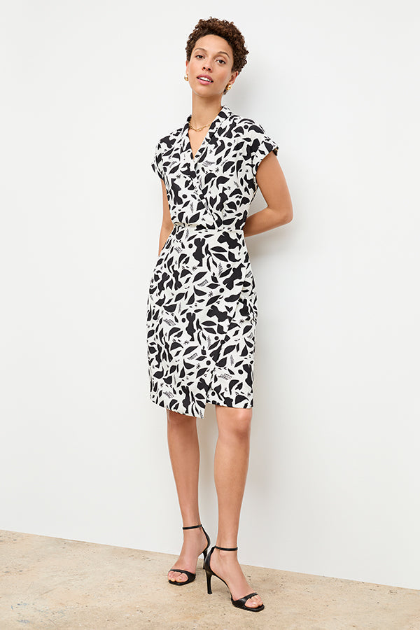 front image of a woman wearing the tory dress in icon print | Exclude | Grid