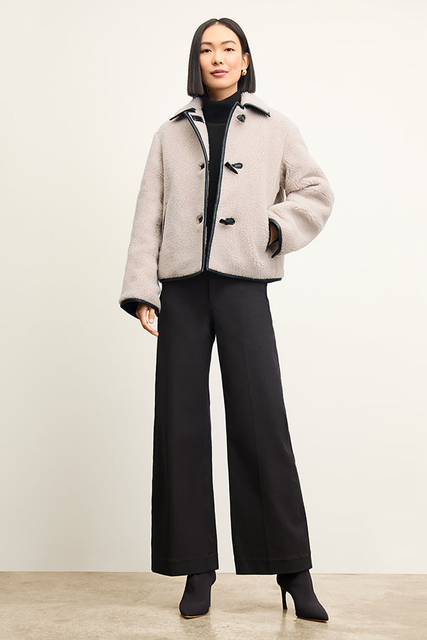 Front image of a woman wearing the Milo Jean in Black | Exclude