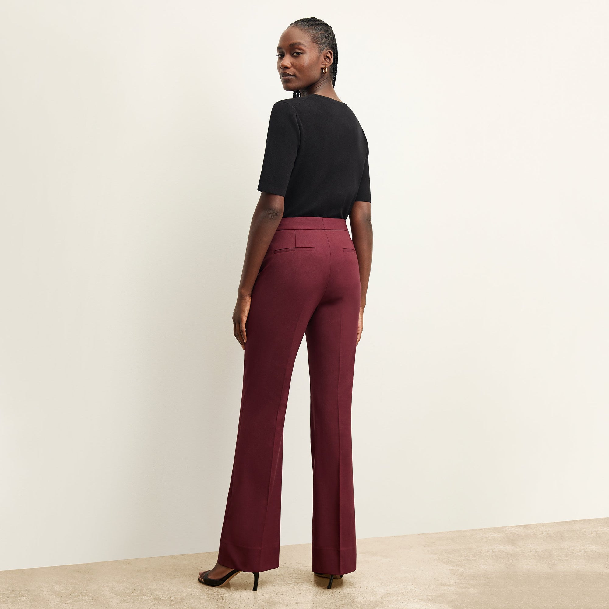 back image of a woman wearing the horton pant in shiraz