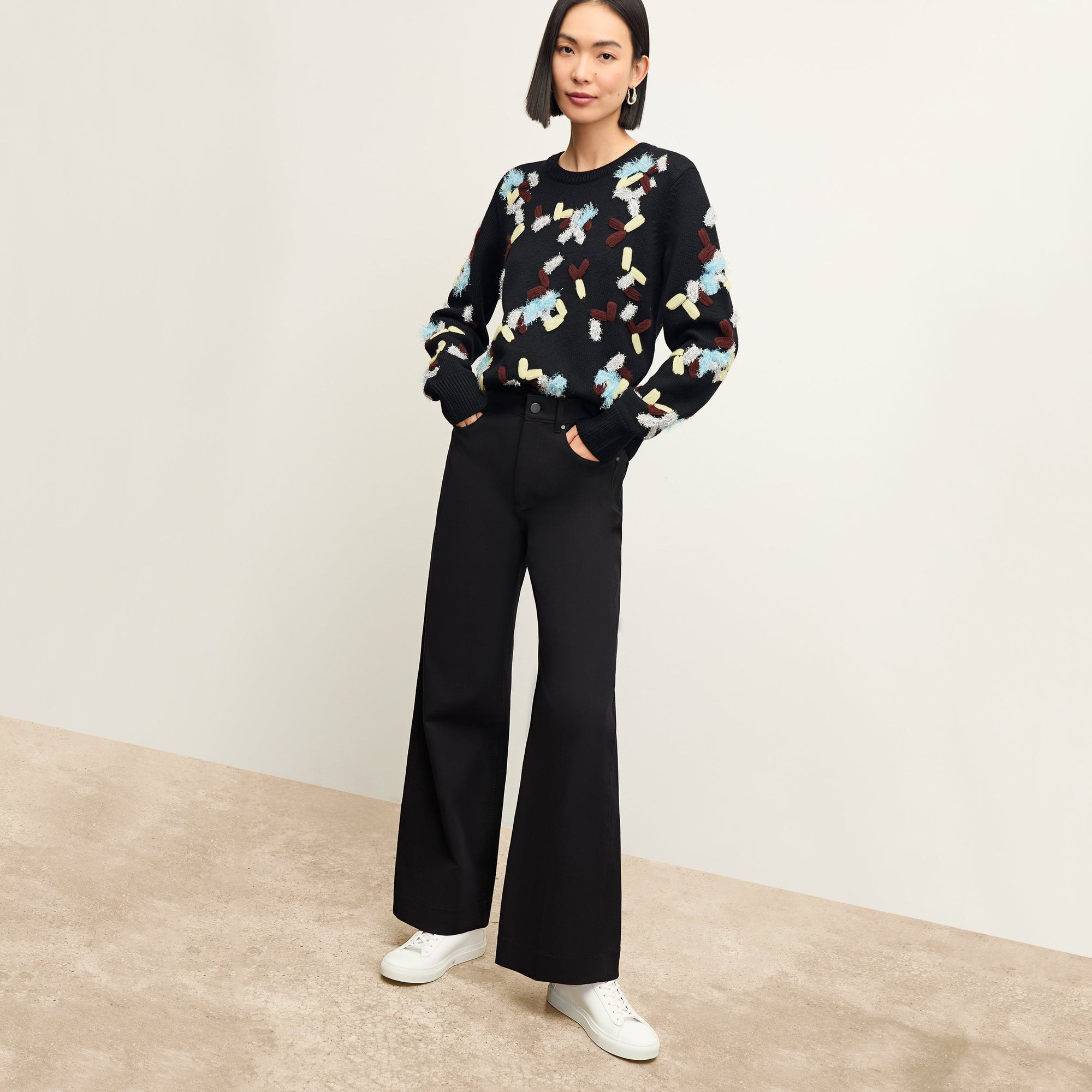 Front image of a woman wearing the Milo Jean in Black | Exclude