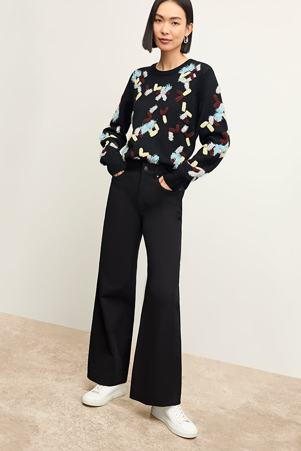 Front image of a woman wearing the Milo Jean in Black | Exclude