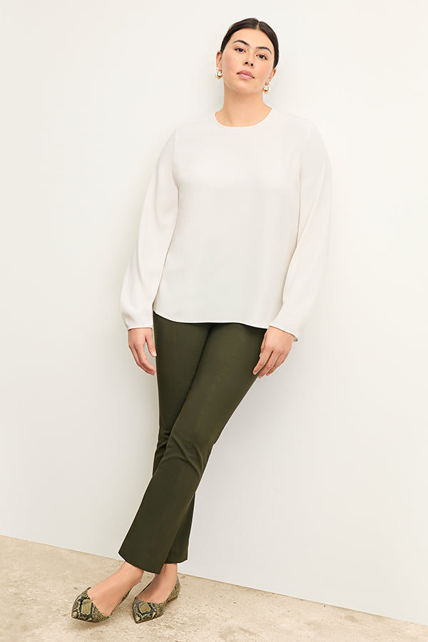 front image of woman wearing foster pant in dark olive | Exclude