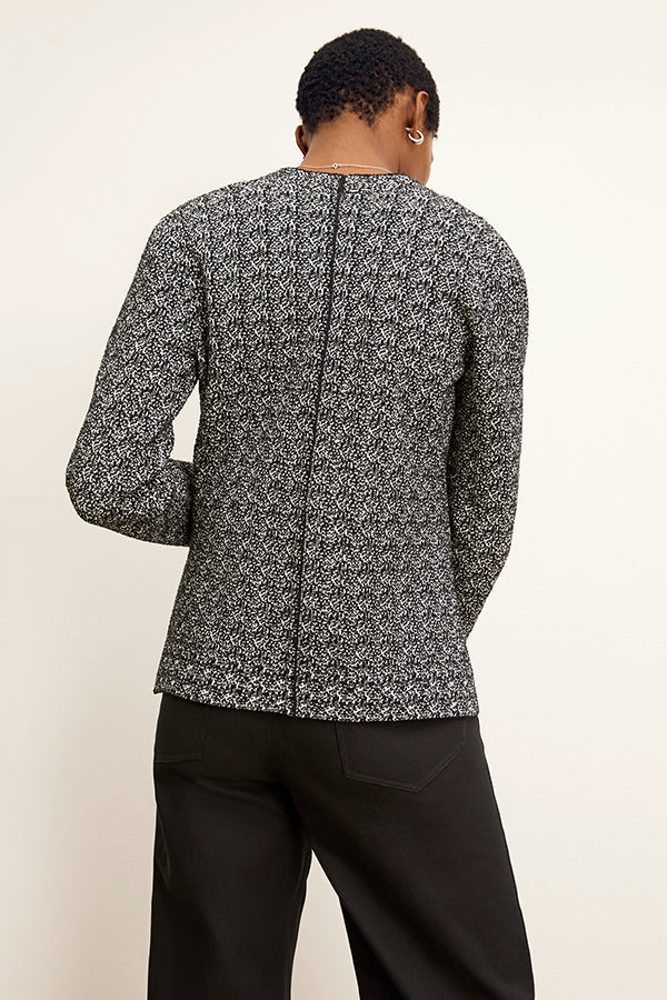 front image of a woman wearing the woolf jardigan in black/ivory | Exclude