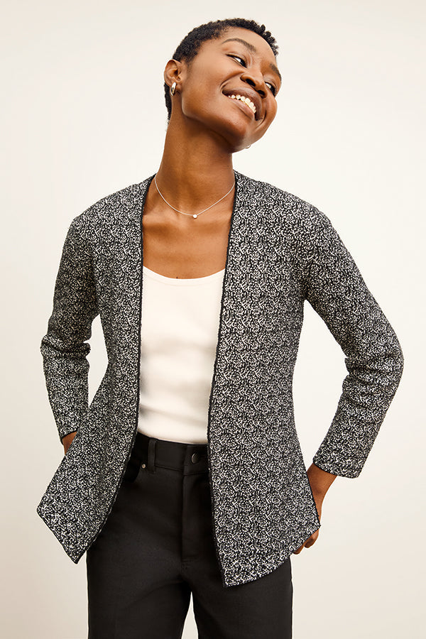 front image of a woman wearing the woolf jardigan in black/ivory | Exclude | Grid