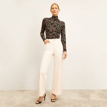 Front image of a woman wearing the Milo Jean in Tusk | Lead