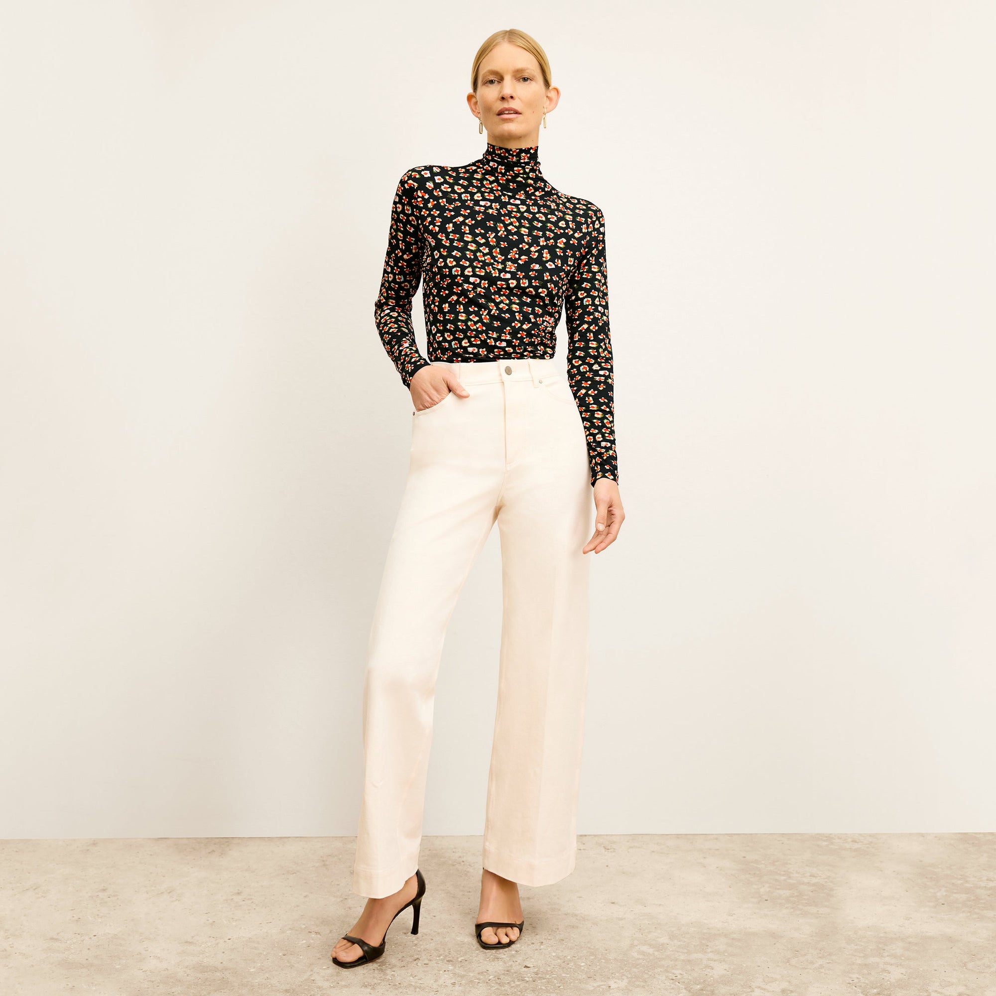 Front image of a woman wearing the Milo Jean in Tusk | Lead