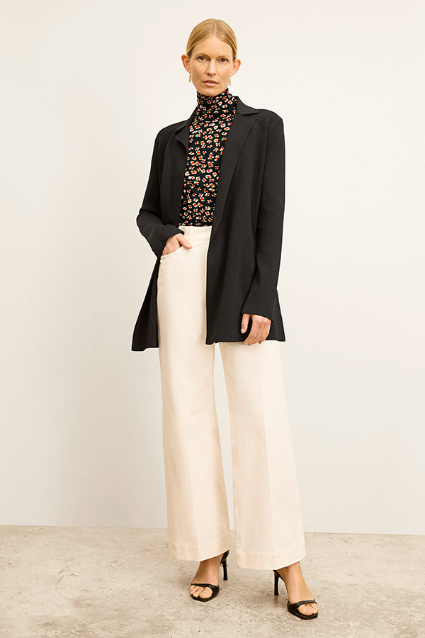 Front image of a woman wearing the Milo Jean in Tusk | Exclude