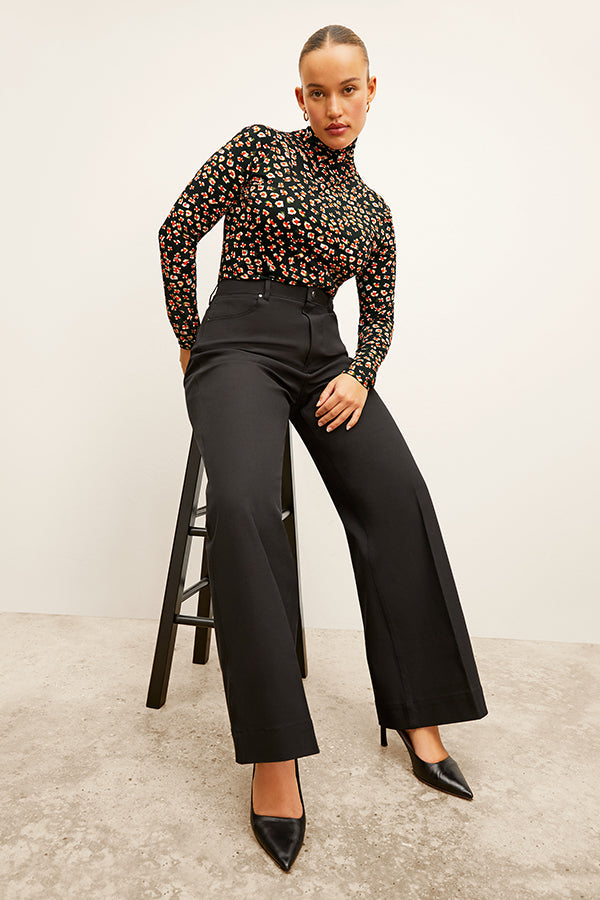 Front image of a woman wearing the Milo Jean in Black | Exclude