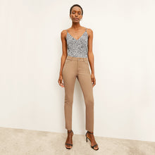 front image of a woman wearing the roma jean in saddle 