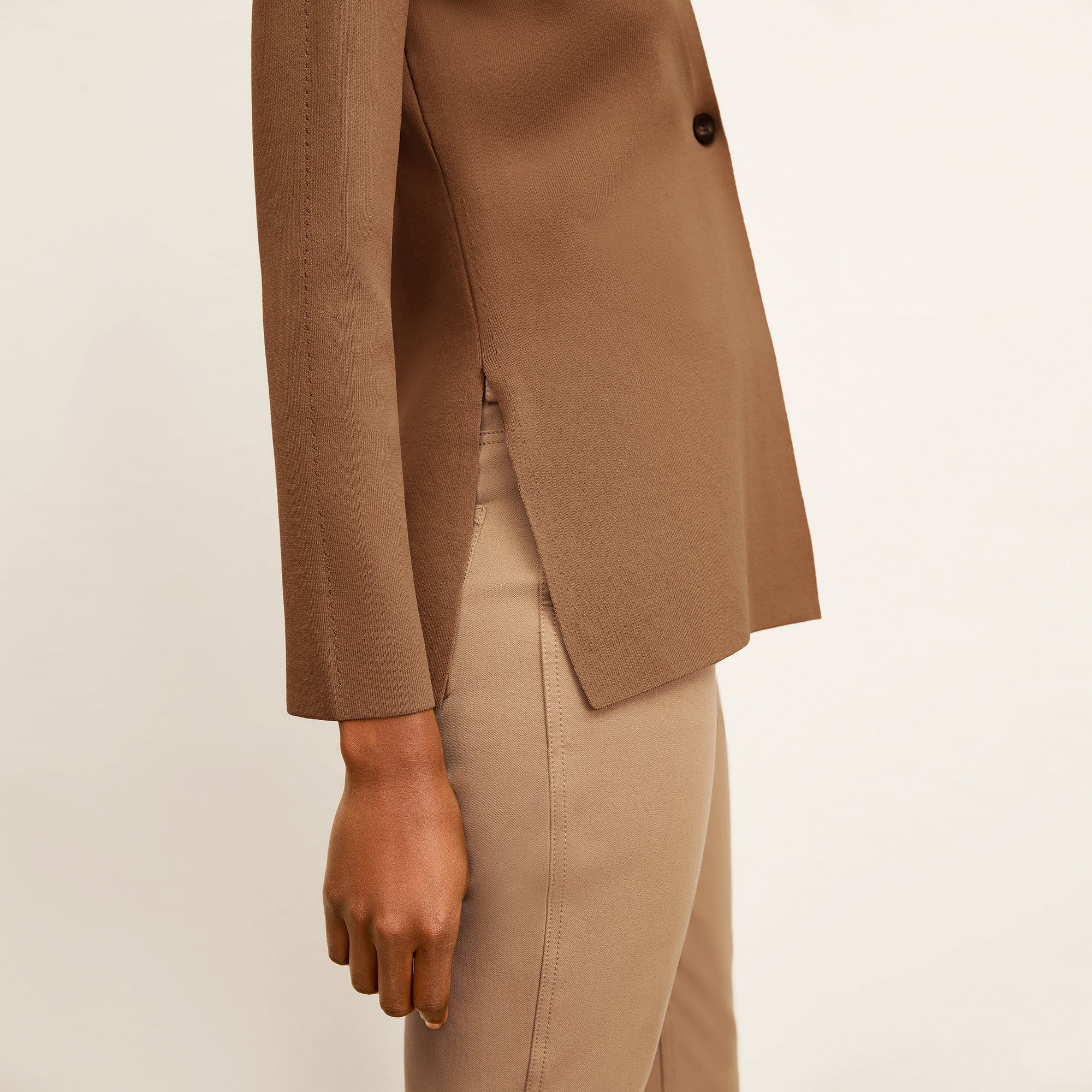 side image of a woman wearing the roma jean in saddle | Exclude